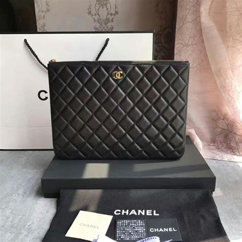 black chanel clutch price|Chanel clutch with hand strap.